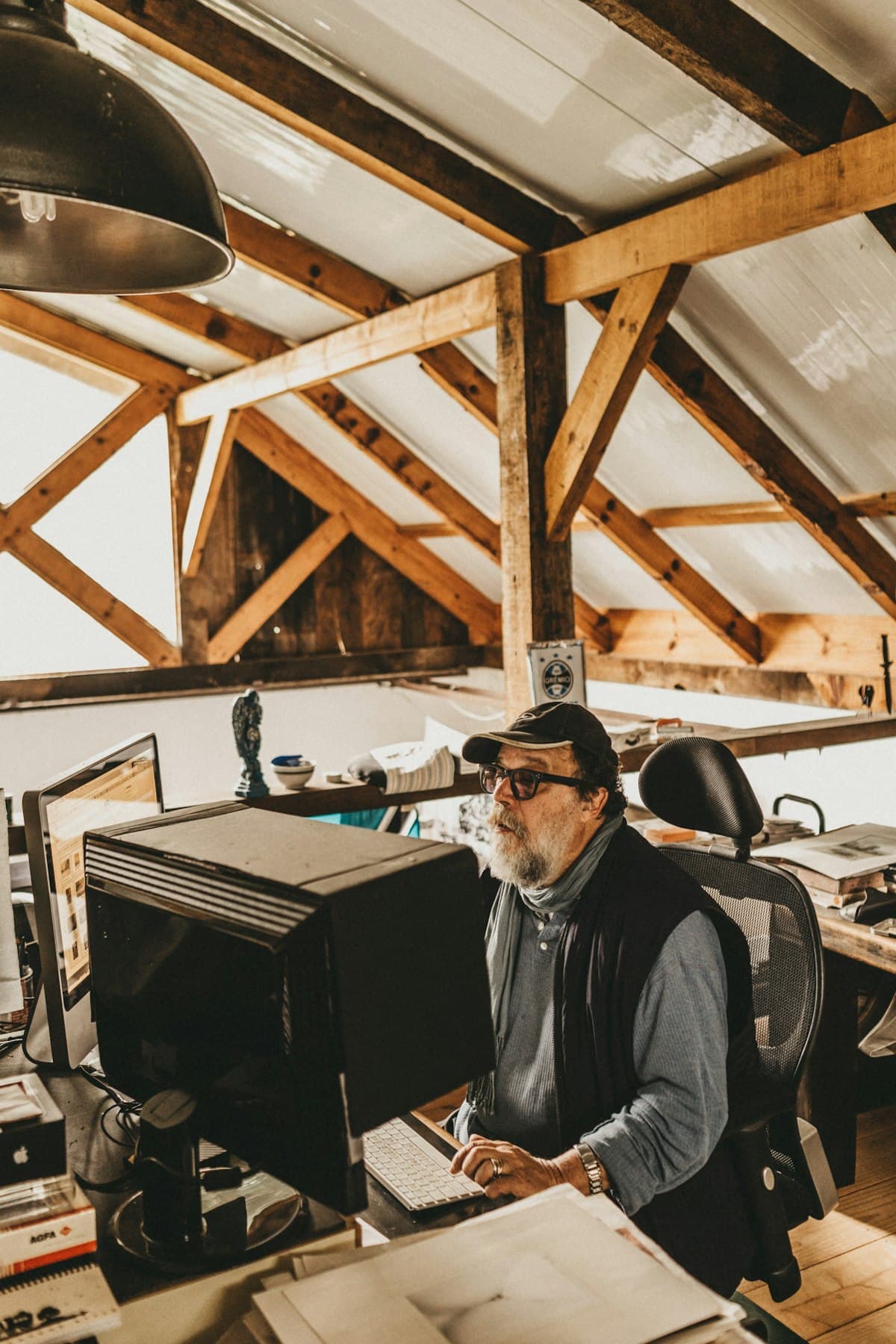 Senior developer working at a dual-monitor desk